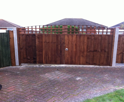 Driveway gates with bow trellis on top